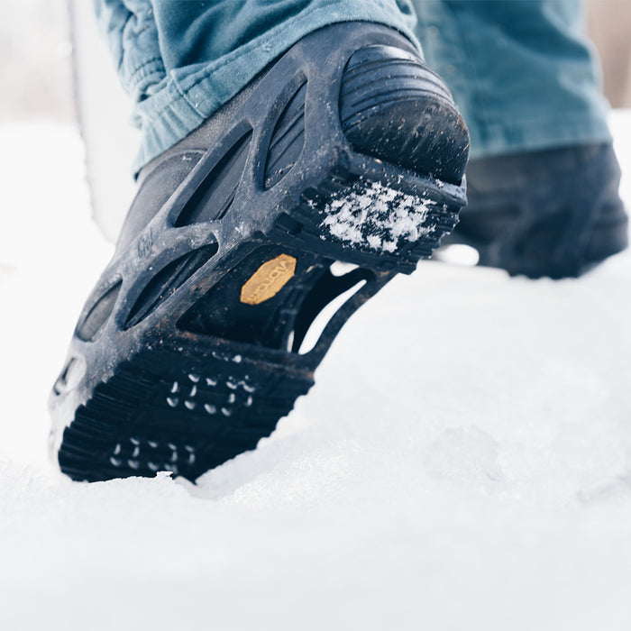 STRIDE Full Foot Ice Traction Overshoes were designed for maximum traction on ice and snow. Multi-directional traction plates on the STRIDE bite into snow and ice. 