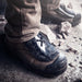 The METGUARD is a unique device that protects the metatarsal area of the foot. Designed to compliment steel cap footwear. The METGUARD is secured to your footwear with existing laces or with optional straps for footwear that does not have laces.